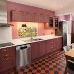 Earth Red & Antique Rose cabinetry, checkerboard floor in Harbury bespoke kitchen