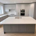 Quartz worktop and island, two-tone shaker style cabinetry in Lillington, Leamington Spa